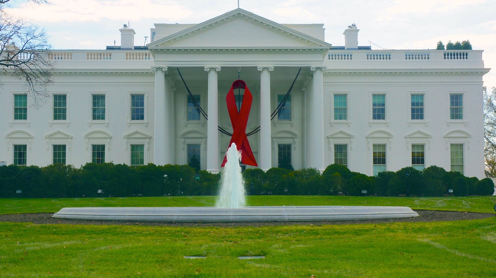 Red ribbon on the North Portico of the White House in honor of World AIDS Day 2013