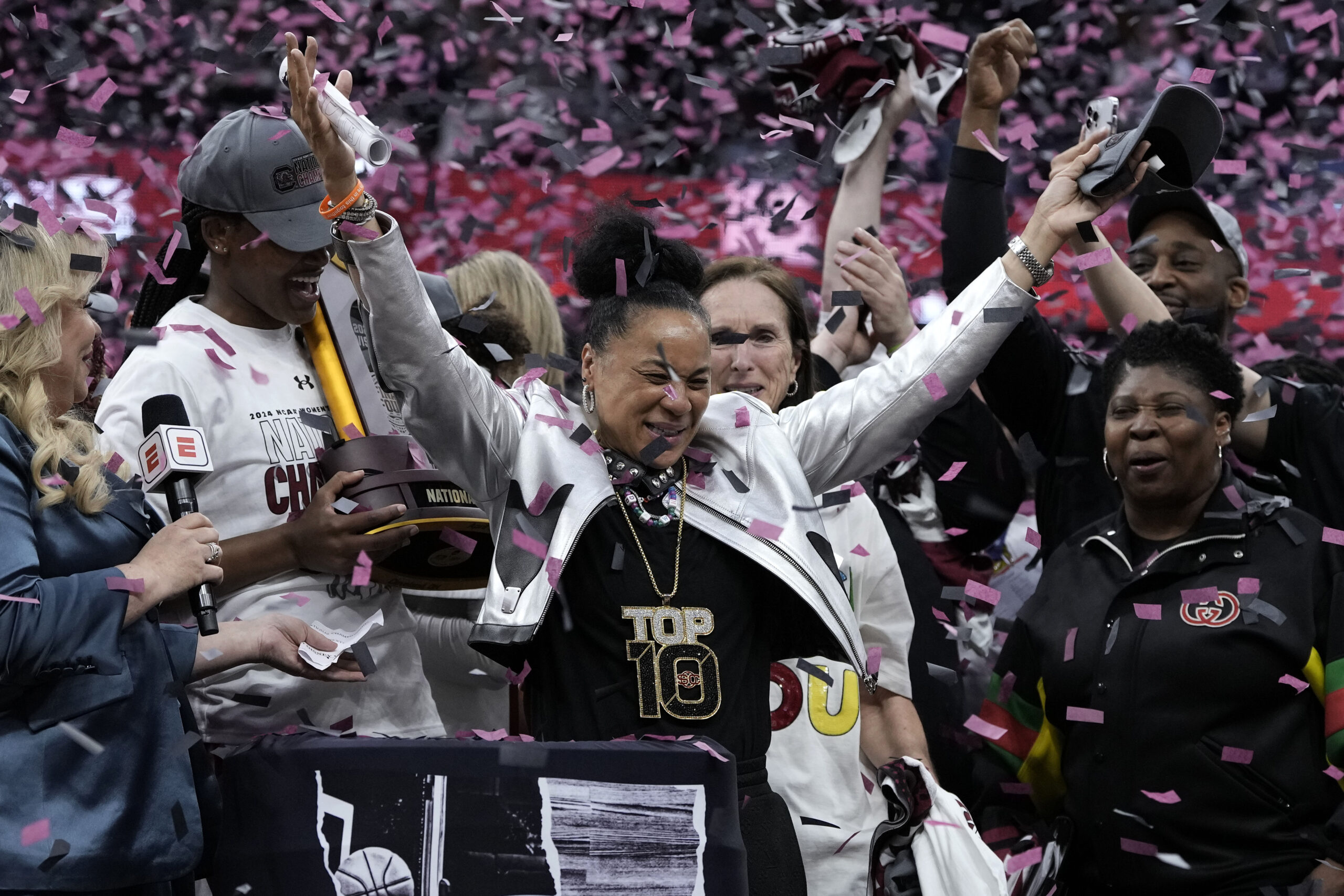 South Carolina head coach Dawn Staley celebrates after the Final Four college basketball championship game against Iowa in the women's NCAA Tournament, Sunday, April 7, 2024, in Cleveland. South Carolina won 87-75.