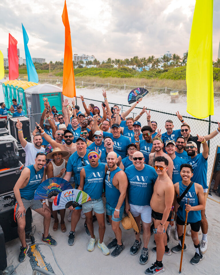 Large group of people in blue at winter party